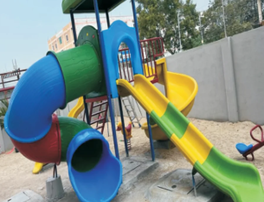 Multi-play station with tube and open slides